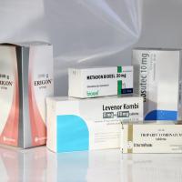 Pharmaceutical boxes with dispersion varnishing